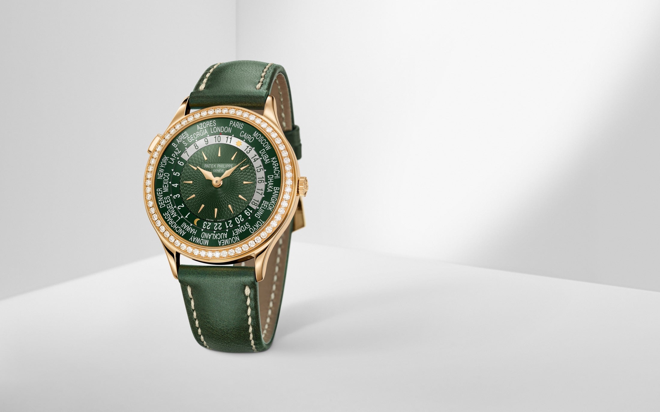 Patek Philippe Women’s Complication World-Time, 18k Rose Gold set with 89 diamonds (~1.03 ct.), 36mm, Ref# 7130R-014 - Image 10